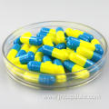 Size 00 light blue and yellow capsule shell